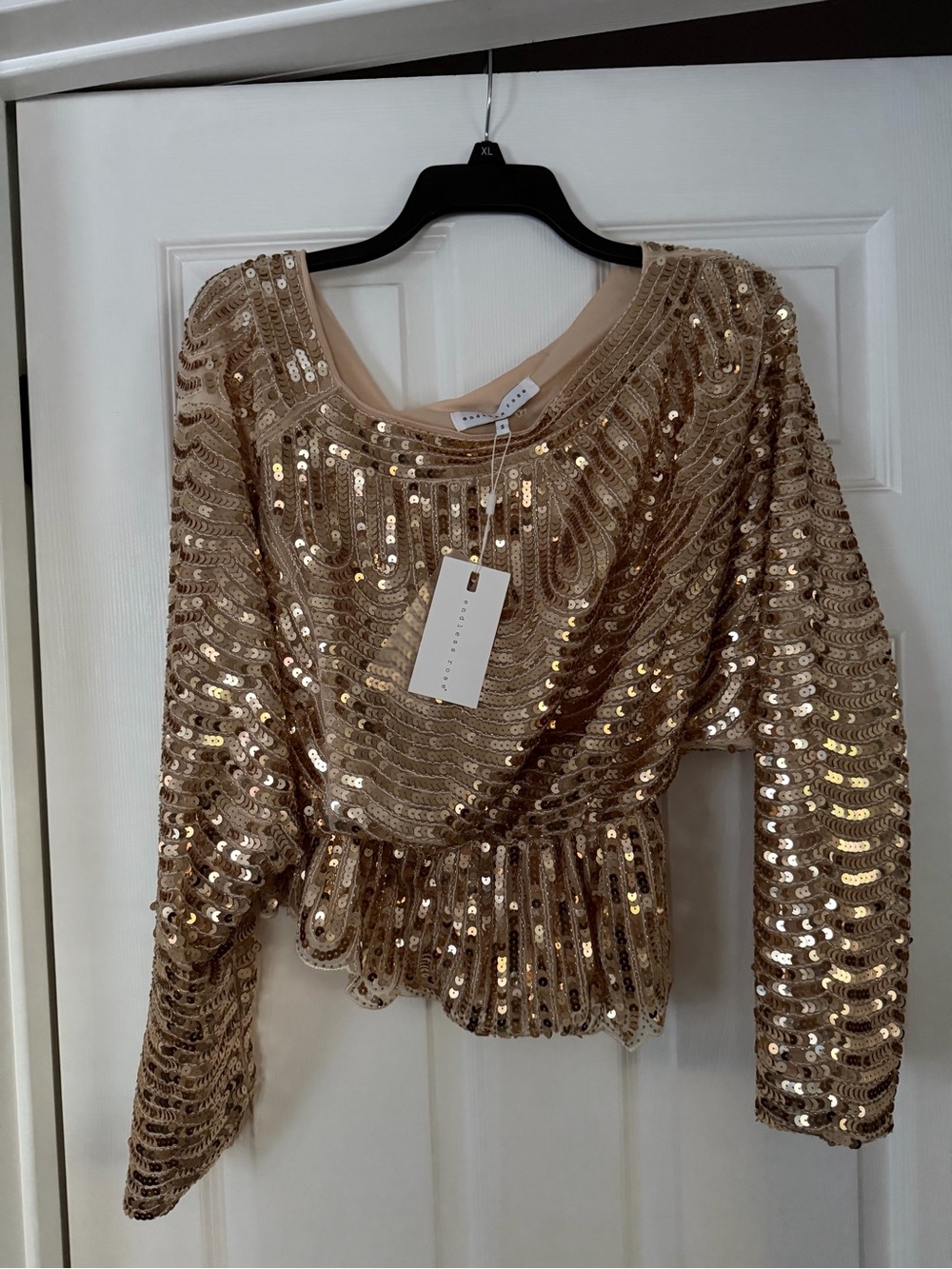 Endless Rose Gold Sequin Peplum Long Sleeve Top